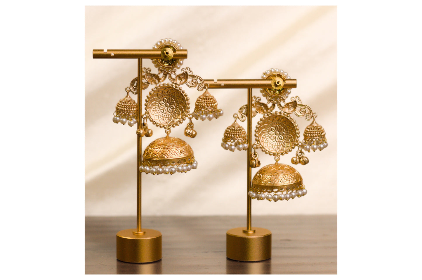 Green and Gold Three Jhumka Earrings