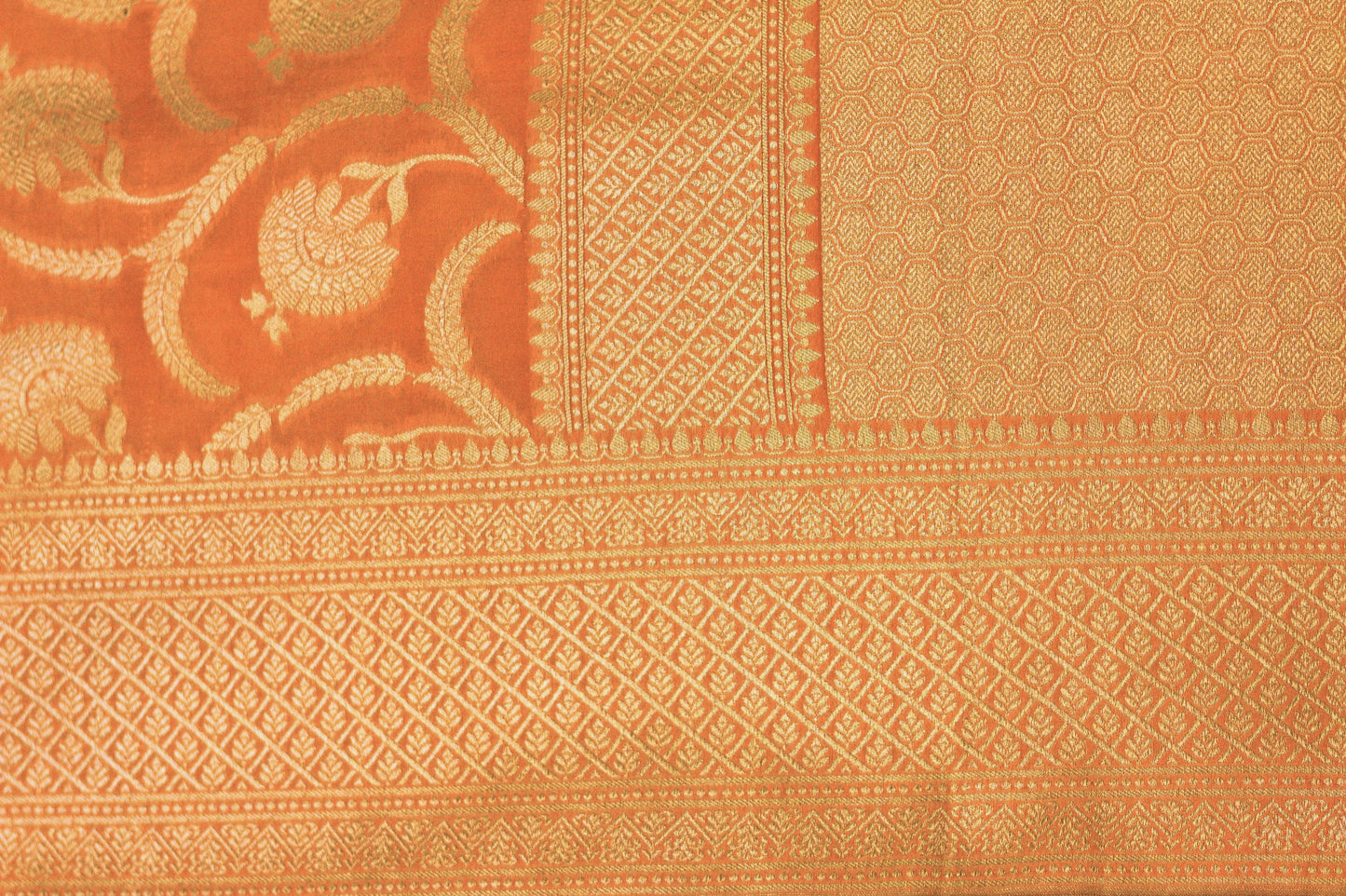 Apricot Pure Katan Silk Saree with Jangla Pattern And Kadhiyal border.