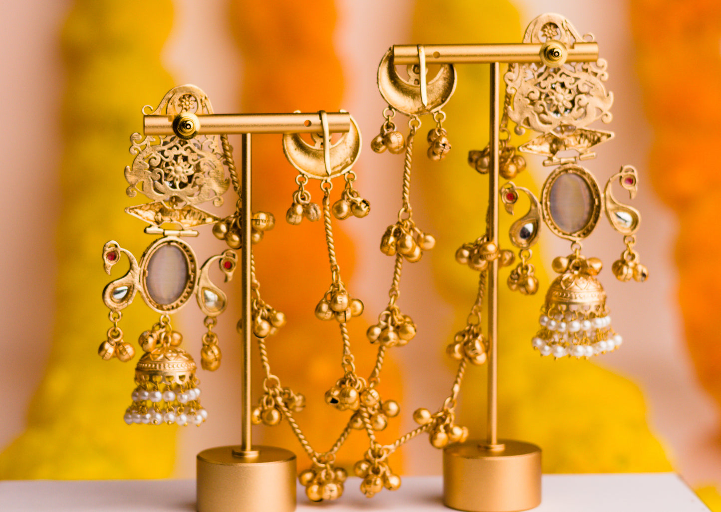 Green Shy Bird Jharoka Jhumkas with Kaan Chains.