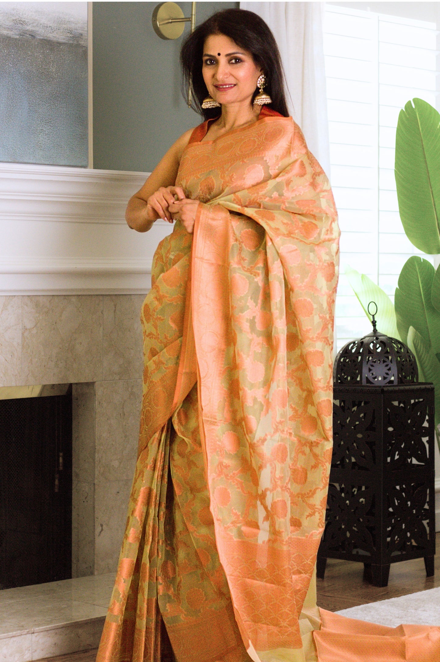 Green Banarasi Organza Saree with Copper Zari Border and Pallu.