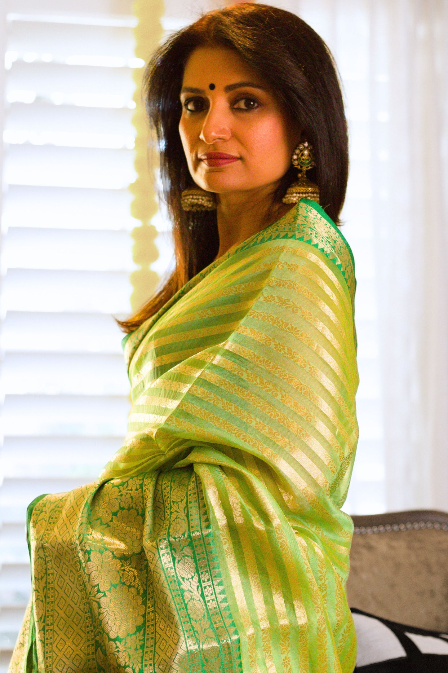 Dewy Green Banarasi Handloom Tissue Saree with Gold Stripes & Zari Border