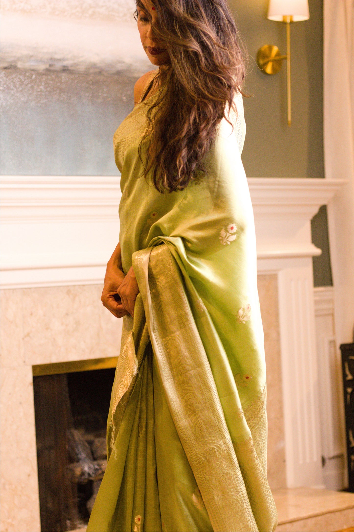 Light-Weight Pearlescent Green Pure Katan Silk Banarasi Handloom Saree with All Over Kadhwa Motifs and Intricate Bel Border in Subtle Gold Jari.