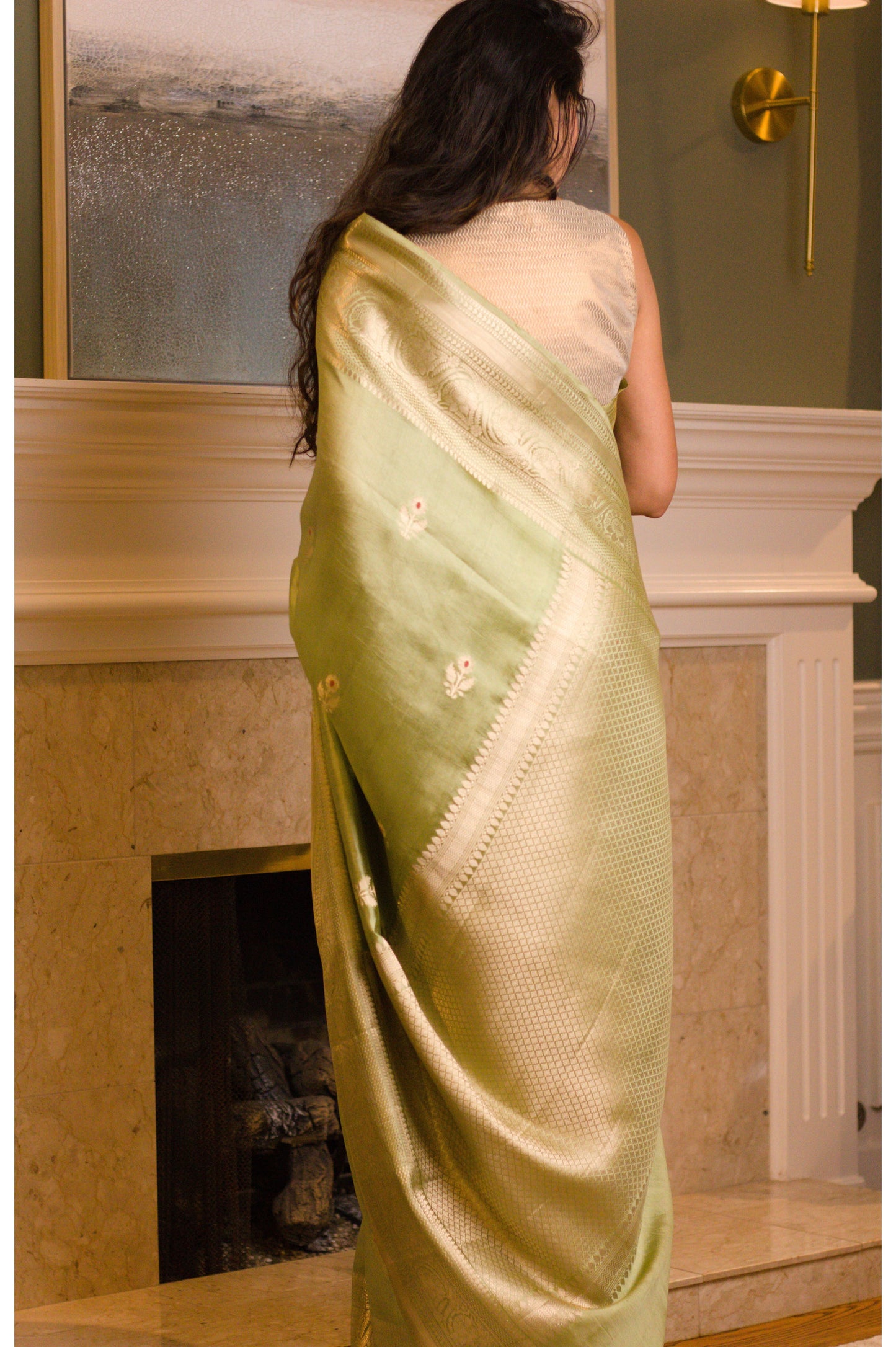 Light-Weight Pearlescent Green Pure Katan Silk Banarasi Handloom Saree with All Over Kadhwa Motifs and Intricate Bel Border in Subtle Gold Jari.