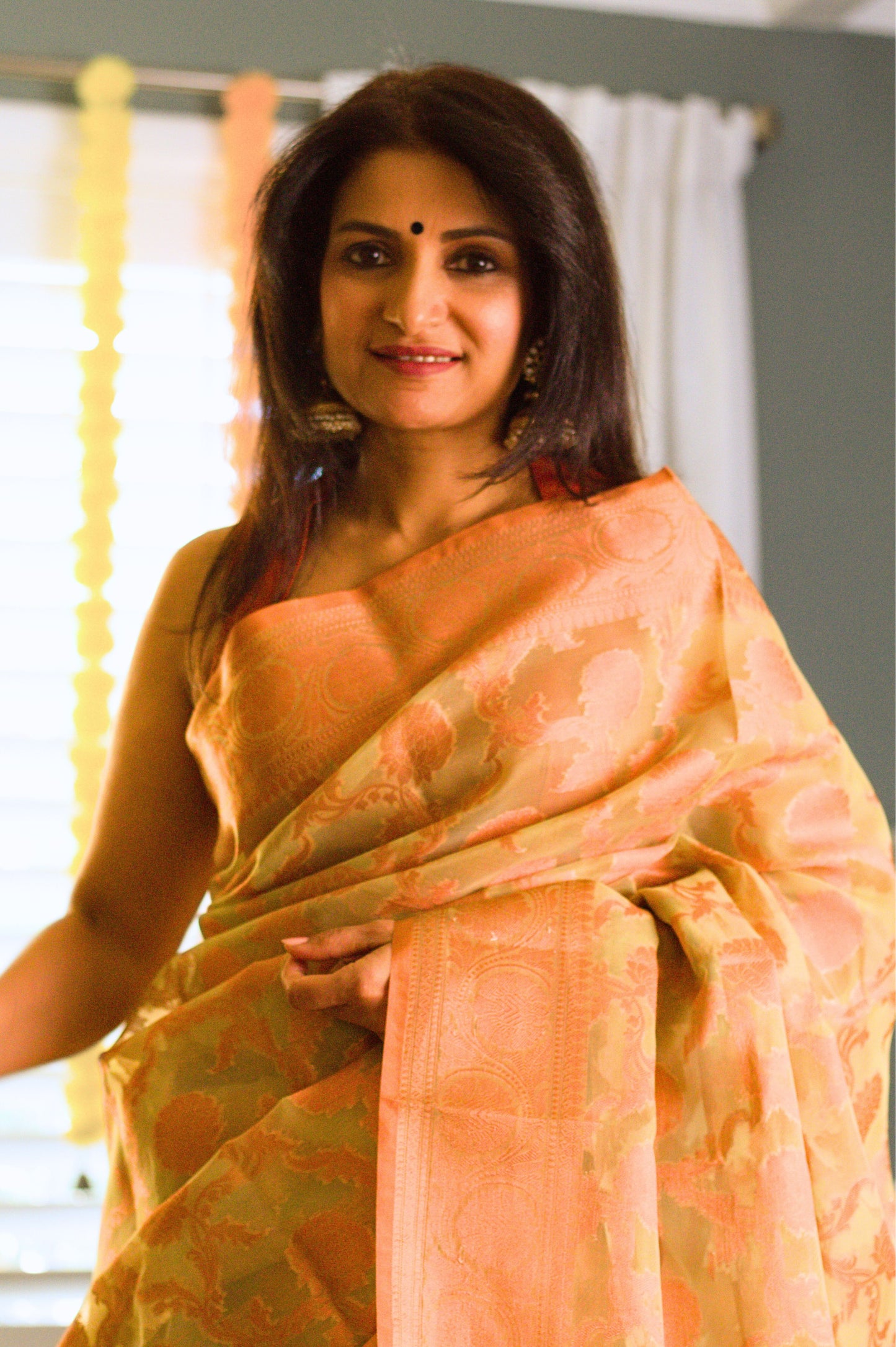 Green Banarasi Organza Saree with Copper Zari Border and Pallu.