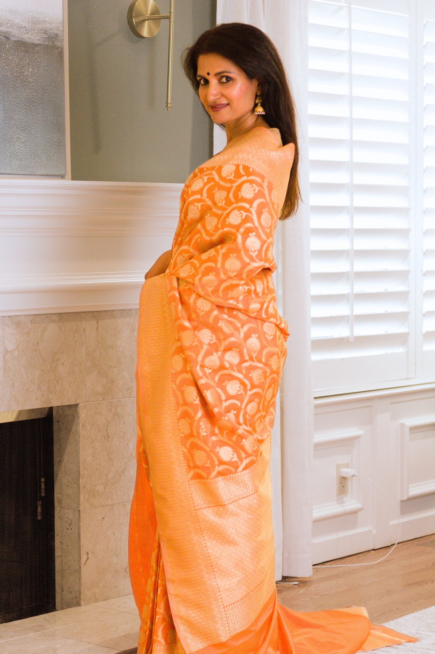 Apricot Pure Katan Silk Saree with Jangla Pattern And Kadhiyal border.