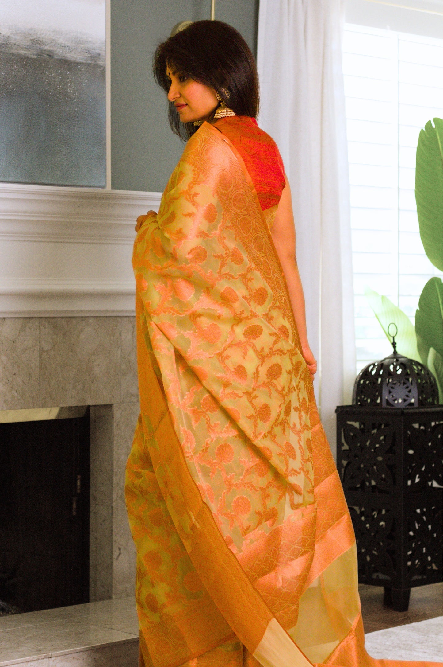 Green Banarasi Organza Saree with Copper Zari Border and Pallu.