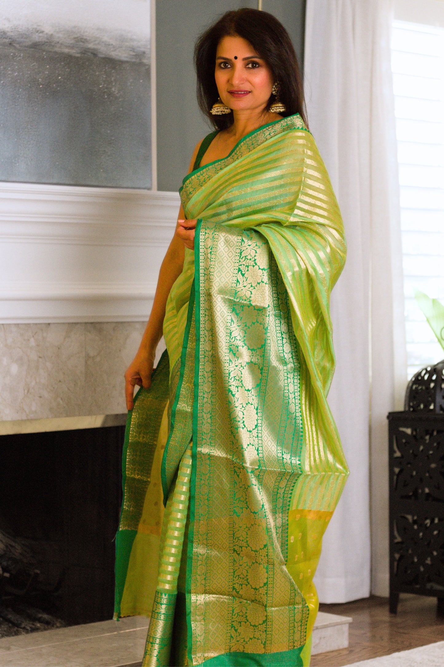 Dewy Green Banarasi Handloom Tissue Saree with Gold Stripes & Zari Border