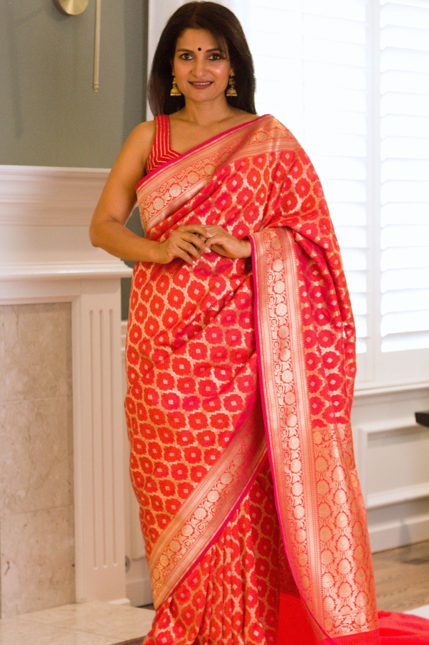 Iridescent Red Banarasi Pure Katan Silk Saree With Gold Zari.