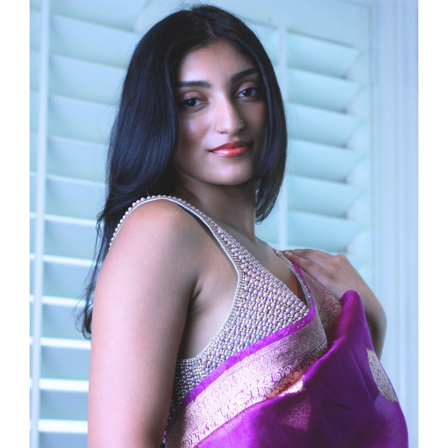 Mauve Sleeveless Pearl and Stone Saree blouse.