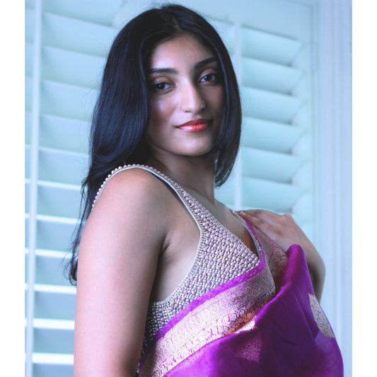Mauve Sleeveless Pearl and Stone Saree blouse.