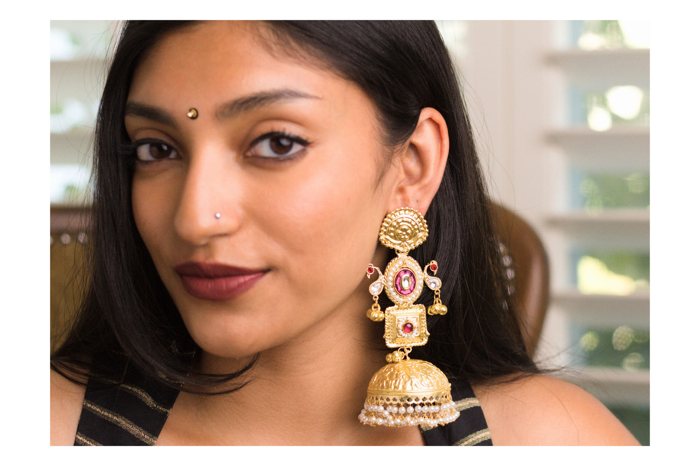 Rani Shy Bird Gold Jhumkas