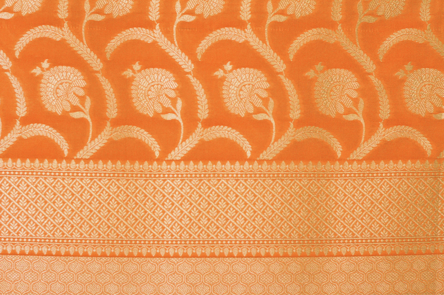 Apricot Pure Katan Silk Saree with Jangla Pattern And Kadhiyal border.