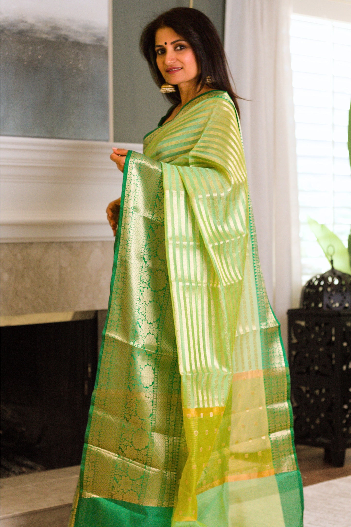 Dewy Green Banarasi Handloom Tissue Saree with Gold Stripes & Zari Border