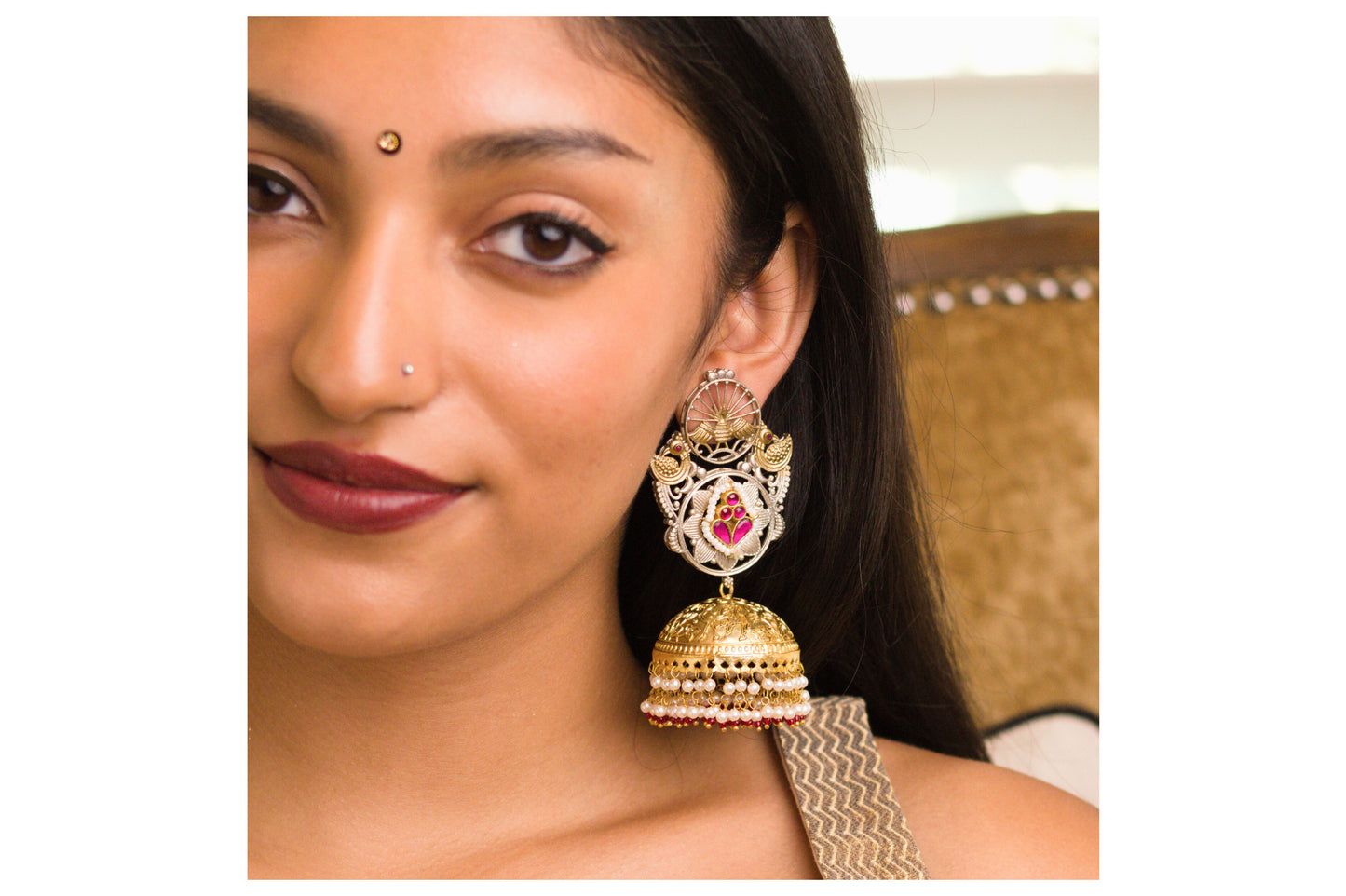 Rani Sunburst Mor Thappa Jhumkas