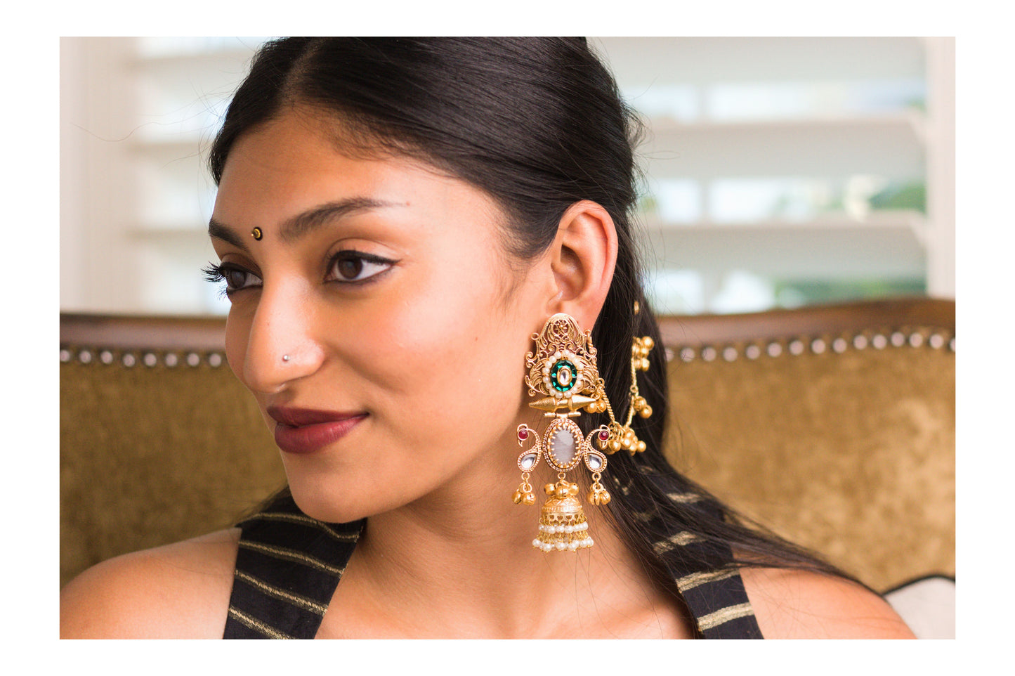 Green Shy Bird Jharoka Jhumkas with Kaan Chains.