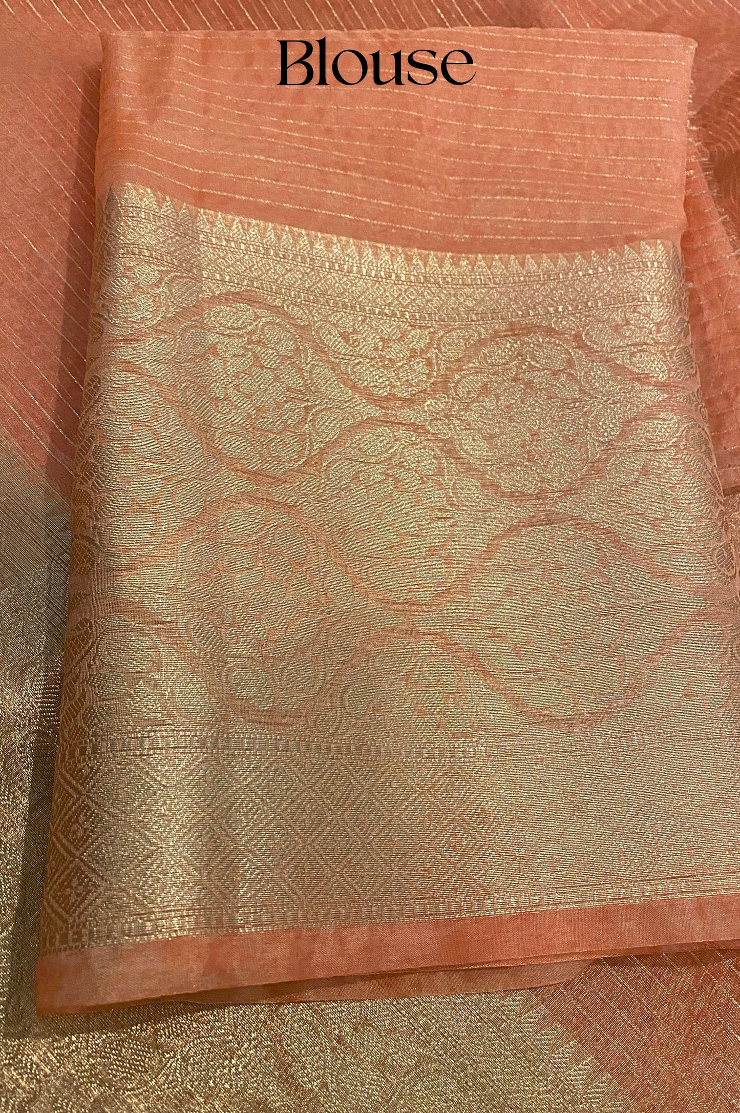Rust Pink Pure Banarasi Organza Saree With Woven Gold Pin Stripes and a Wide Jari border.