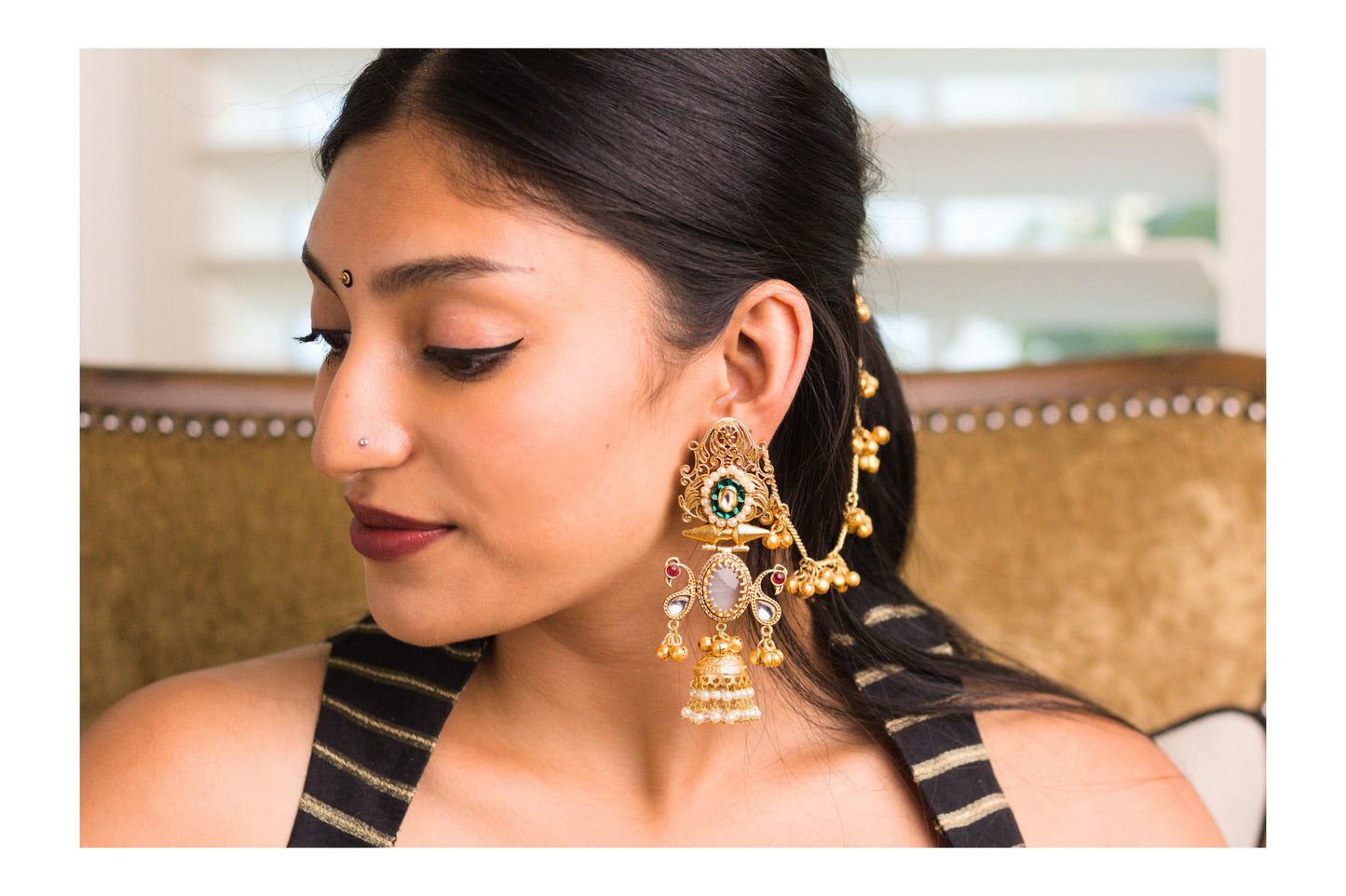 Green Shy Bird Jharoka Jhumkas with Kaan Chains.