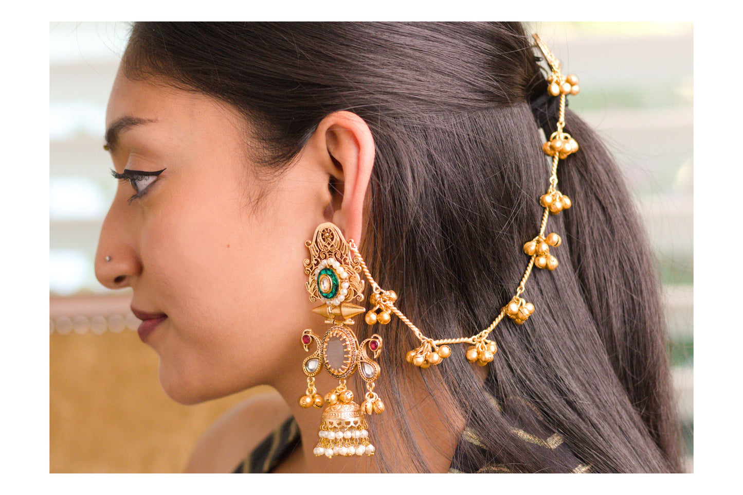 Green Shy Bird Jharoka Jhumkas with Kaan Chains.
