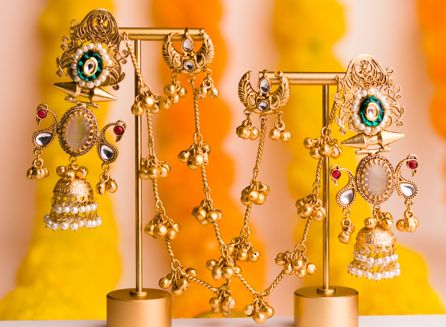 Green Shy Bird Jharoka Jhumkas with Kaan Chains.